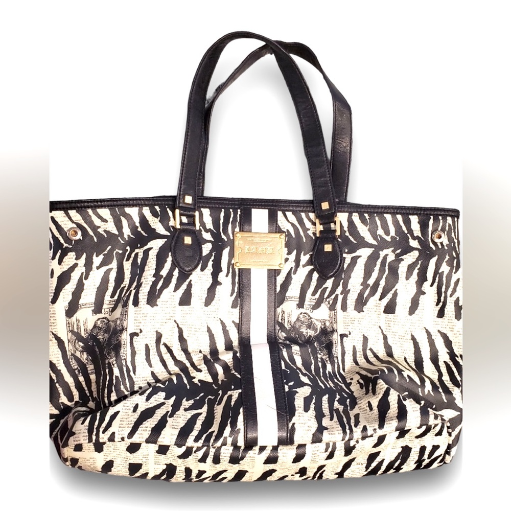 L.A.M.B. Newspaper print design. by Gwen Stefani Zebra Newsprint Tote